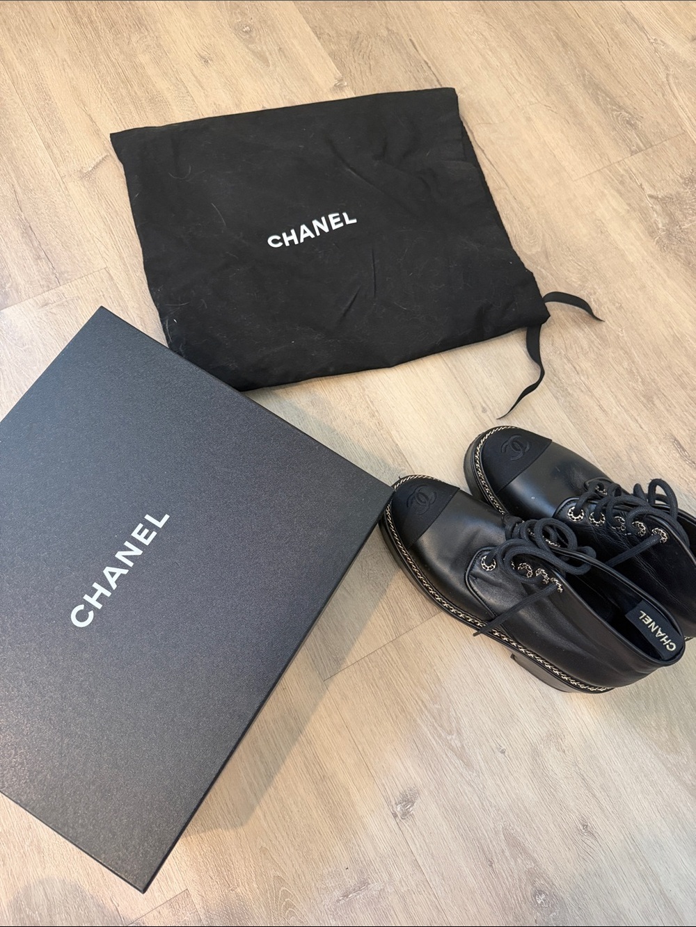 CHANEL Black Leather Lace-Up Oxfords with Logo Cap Toe